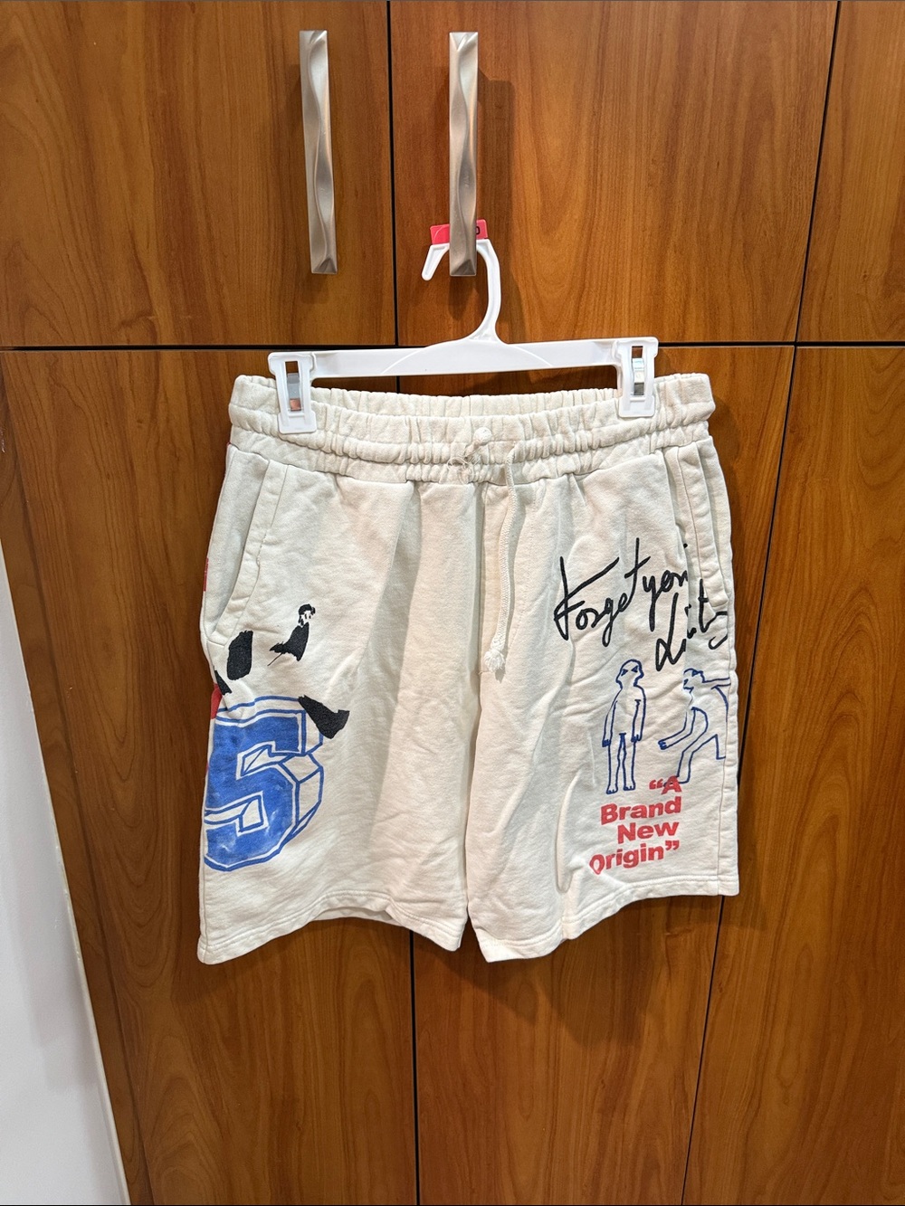 Zara Cream Graphic Drawstring Men’s Athletic Shorts with Blue Accents